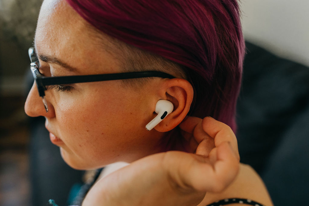 woman with ear buds